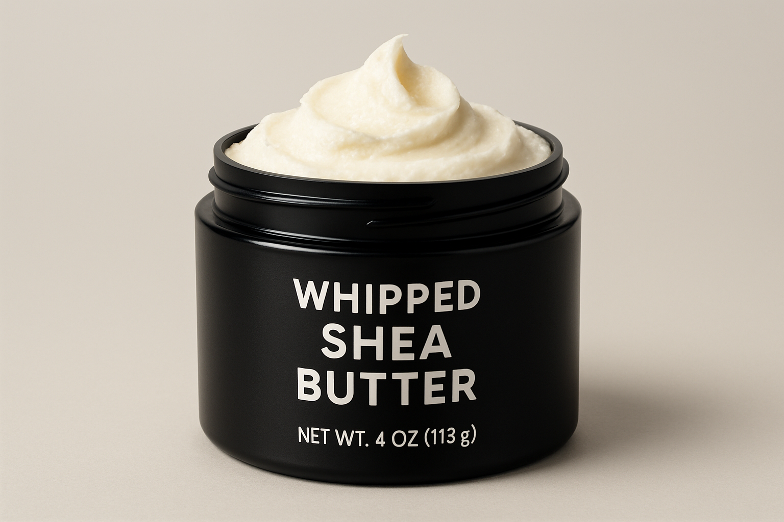 whipped shea butter in a 4oz black plastic jar